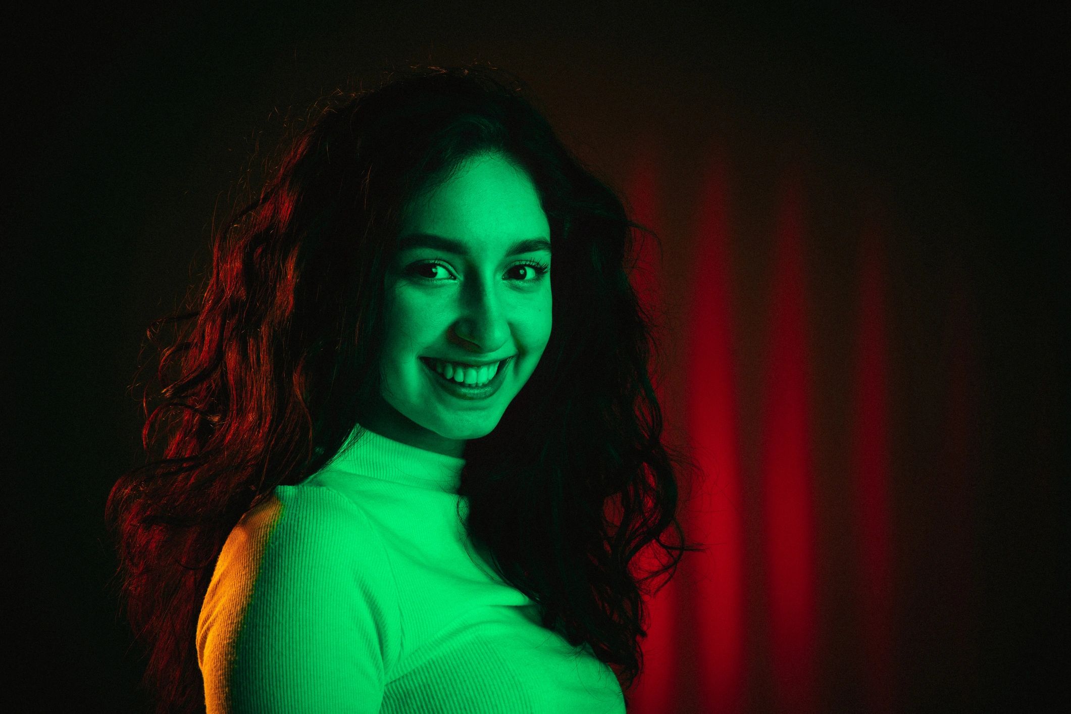Moody cinematic portrait with green accent lighting