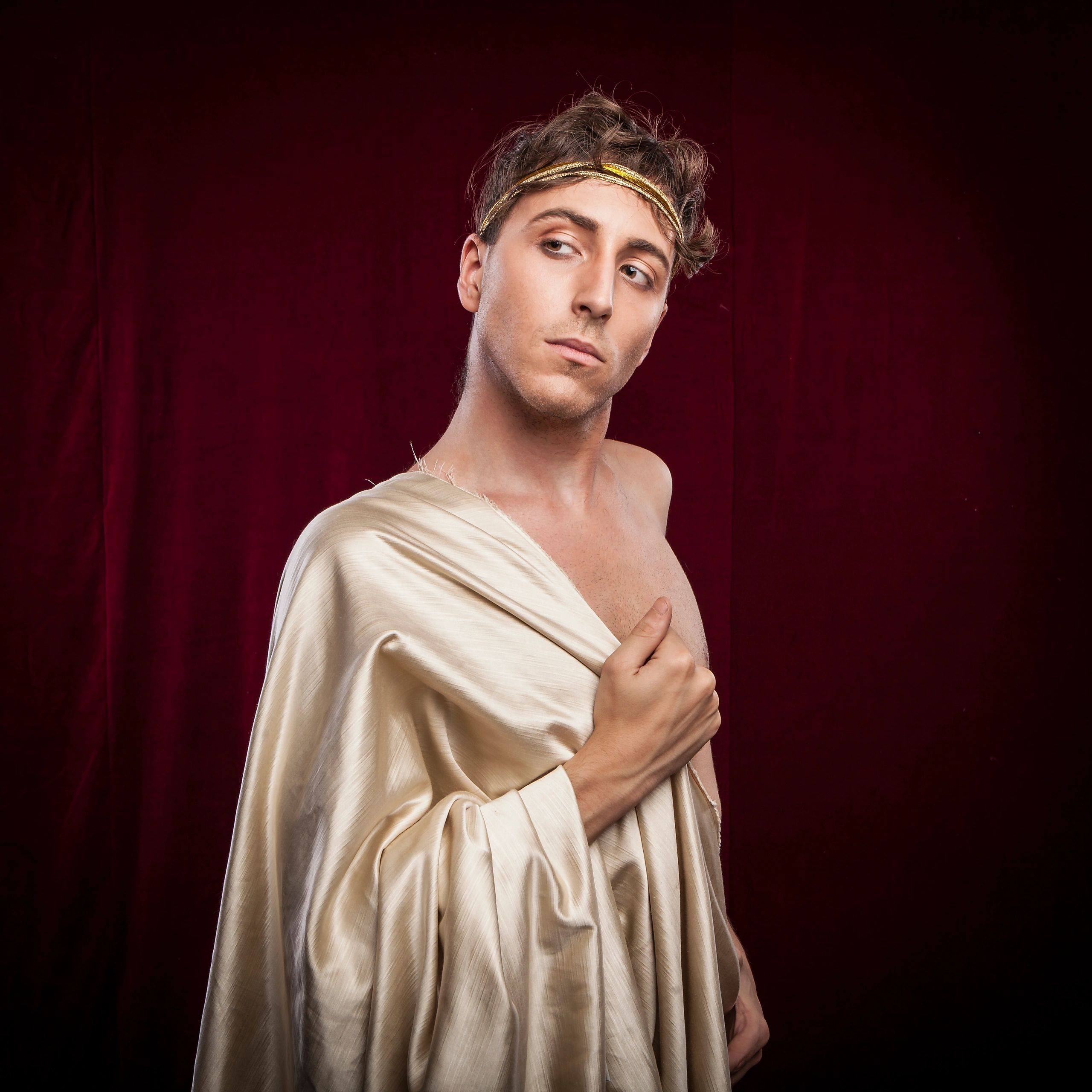 Costumed performer portrait in dramatic lighting