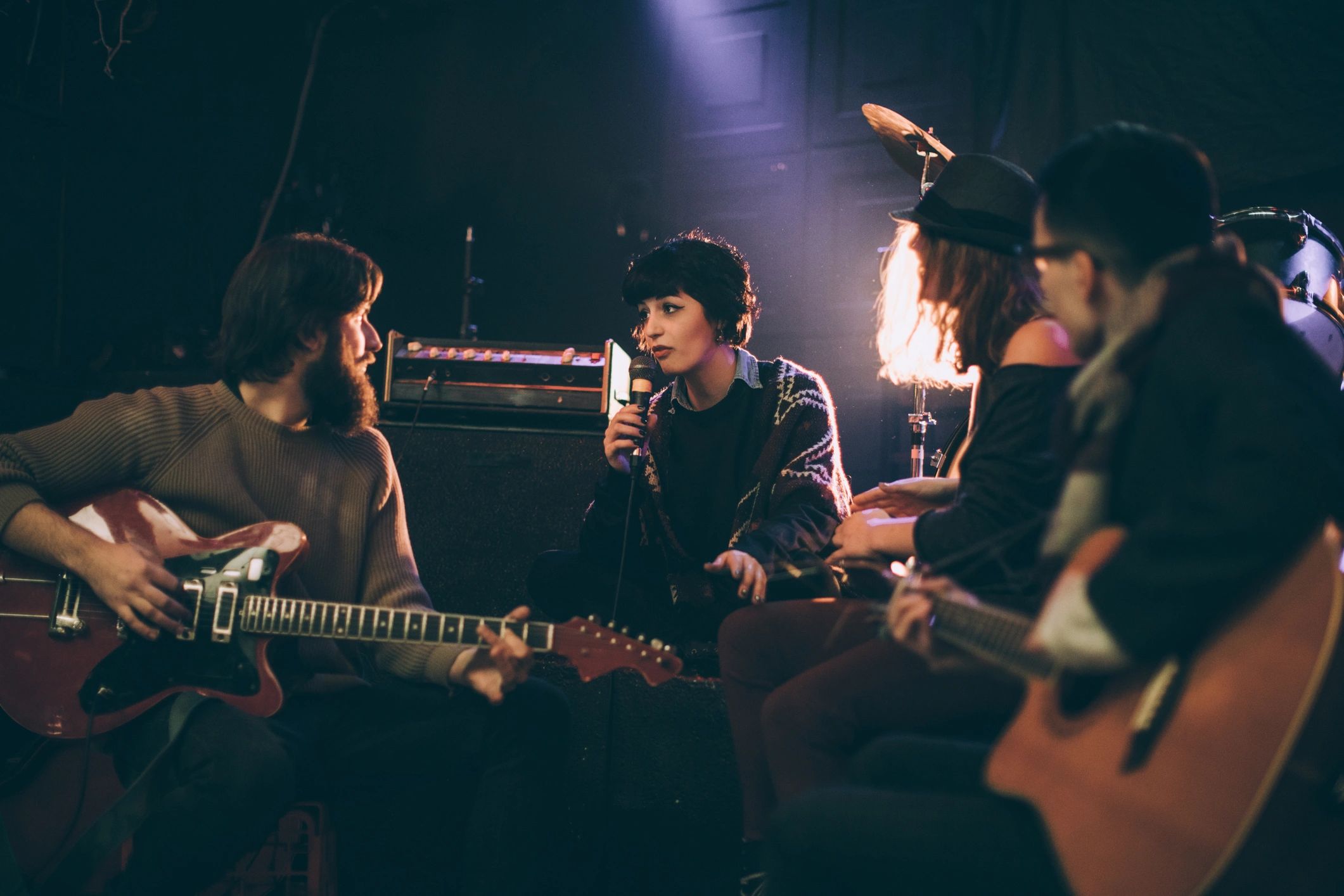 Musicians performing together on stage